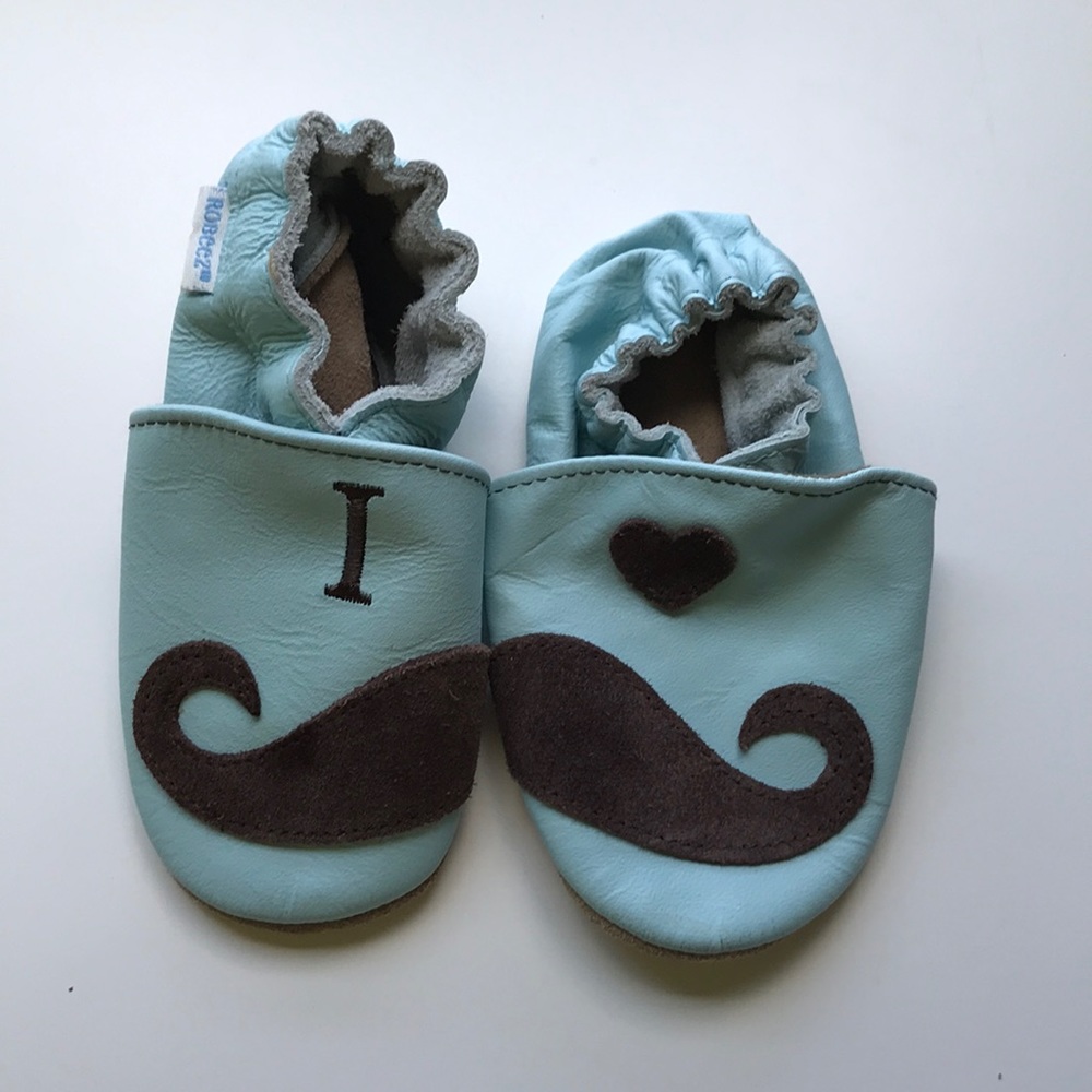 Robeez slippers with moustaches